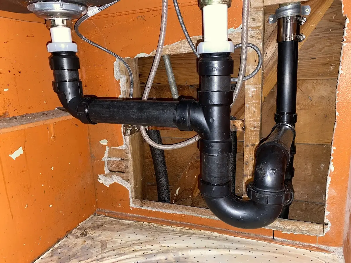 Professional Garbage Disposal Repair equipment and tools on the job in Huntley